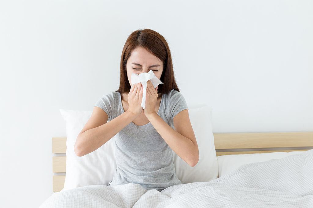 6 Tips To Sleep Better With Allergies, From Hypoallergenic Sheets To Air Filters
